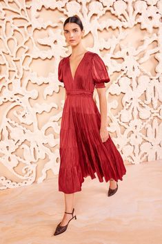 The Mirabelle is a refined yet statement-making dress in our silken plissé satin that’s saturated a deep claret red. Beautifully tiered throughout, it has a V-neckline framed by our signature puff sleeves, side pockets, and a floaty midi-length hem. It fastens with a concealed side zipper. Composition: 100% Polyester Formal Tiered Silk Maxi Dress, Elegant Tiered Silk Dress, Silk Tiered Midi Dress For Evening, Tiered Silk Midi Dress For Evening, Silk Tiered Dress For Formal Occasions, Tiered Silk Formal Dress, Silk Tiered Formal Dress, Formal Tiered Silk Dress, Elegant Red Tiered Midi Dress