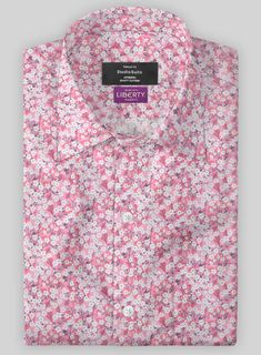 Add a touch of floral flair to your wardrobe this season with our Liberty Illion Cotton Shirt. The shirt offers all-day comfort without sacrificing style. The unique design offers a fresh, versatile look, perfect for a night out on the town.  Made according to your measurements for the special you. Pamper yourself, get Summer Pink Cotton Dress Shirt, Fitted Pink Floral Print Shirt, Floral Dress Shirt Men, Pink And White Floral Dress, Floral Dress Shirt, Grey Tweed Suit, Herringbone Tweed Jacket, White Linen Suit, Green Velvet Jacket