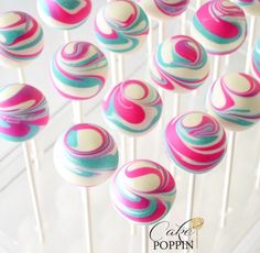 there are many cake pops on the stick