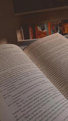 an open book sitting on top of a table