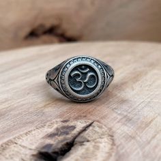 Mens Ohm Ring, Mens Signet Ring, Unique Rings For Men Oxidized Silver Buddhist Ring Custom Mens Jewelry Husband Gift For Him Antique Pinky Discover meaningful gifts for him to find the perfect gifts for the men in your life.  Antique Om Ring ● Mens Ohm Ring ● Mens Signet Ring ● Unique Rings For Men ● Oxidized Silver Buddhist Ring ● Custom Mens Jewelry ● Husband Gift For Him Metal: 925k Sterling Silver Weıght: 13 gr Color: Oxidized Silver Color or Gold Color Dimensions: 0.6 x 0.6 inch Please make Adjustable Hallmarked Spiritual Signet Ring, Spiritual Sterling Silver Rings With Engraving Option, Symbolic Engraved Ring With Oxidized Finish For Promises, Adjustable Symbolic Rings With Polished Finish, Spiritual Round Signet Ring With Polished Finish, Spiritual Signet Ring With Polished Finish, Adjustable Sterling Silver Spiritual Signet Ring, Spiritual Open Signet Ring With Polished Finish, Oxidized Finish Promise Ring