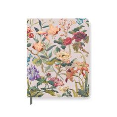 an open notebook with flowers on the front and bottom cover, sitting on a white surface