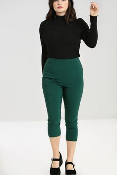 Fitted capri pants/pedal pushers. Self fabric waistband. Darts in the front to shape. Centre seam on the back. V-shaped gap at the hem of the back. Zip in the centre back seam. 2 colours available. Fabric content: 75% Rayon, 22% Nylon 3% Elastane. London Winter Fashion, The 50s Fashion, Spin Doctors, Pedal Pushers, Bunny Outfit, Beach Dresses Summer, 50s Fashion, 1950s Fashion, Trouser Pants