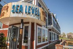 the sea level restaurant is located on the side of the building