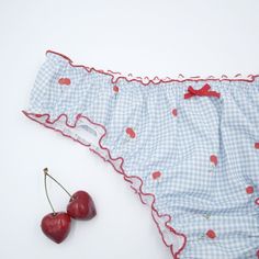 This summer style cherry pattern  blue checkered panty is made of 100% cotton fabric and designed and handmade by me. (gusset part is made by elastic cotton) It features a red satin ribbon in the front.  A beautiful gift for that person or treat yourself. Please refer to the size chart (last image in the listing) for general sizing.  Choose a larger size if you like this panty style more wrinkled.  Please wash it by hand in lukewarm water, wash dark colors separately, do not tumble dry. If you n Cute Cotton Bottoms For Daywear, Sweet Style White Bottoms For Summer, Sweet White Bottoms For Summer, Fitted Cotton Summer Bloomers, Sweet White Summer Bottoms, Summer Cotton Bloomers For Loungewear, Cute Summer Bottoms For Daywear, Cute Summer Daywear Bottoms, Cute Blue Summer Bloomers