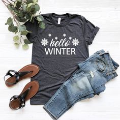 Hello Winter Shirt, Hello Winter T-Shirt, Christmas Shirt, Holiday Shirt, Family Winter Shirt, Winter Season Shirts, Christmas, Hi! Welcome to my store and it's great to see you here! I'm sure you'll love my designs. Please let me know if you have any questions and recommendations. The Unisex t-shirts are retail fit and a little bit relaxed. If you want to have a fitter look, I recommend you order one size smaller. But make sure you check our size-chart before you place your order. The inscripti White Graphic Tee For Winter, Graphic Tee Cotton T-shirt For Winter, Winter Short Sleeve Tops With Letter Print, Short Sleeve Tops With Letter Print For Winter, Winter Holiday Short Sleeve Shirt, Winter Graphic Tee With Relaxed Fit, Winter Graphic Print T-shirt With Short Sleeves, Short Sleeve Holiday Shirt For Winter, Winter Graphic Print Short Sleeve T-shirt