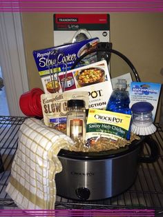 a crock pot is sitting on top of a rack with some items in it