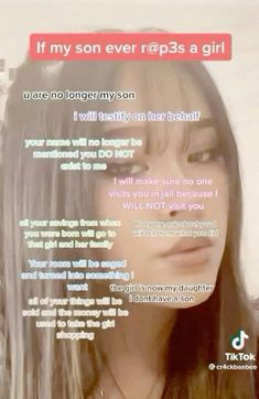 a woman with long gray hair is looking at the camera and has an interesting message on her face