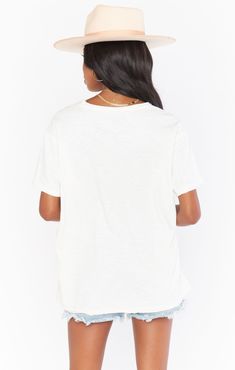 Show your spirit in the Cooper Tee! It's the perfect everyday t-shirt for a laid-back yet trendy look. Made from 100% organic cotton, this tee is soft, breathable, and comfortable for all-day wear. It features a relaxed, boxy fit that's universally flattering and pairs well with a variety of bottoms. Here's what makes the Cooper Tee special: Soft and breathable: Made from 100% organic cotton, this tee is gentle on your skin and perfect for warmer weather. Relaxed fit: The boxy cut drapes comfort Graphic Tee Style, Cracked Screen, Vintage American Flag, American Flag Tshirt, White Graphic Tee, Oversized Graphic Tee, Flag Tshirt, Show Me Your Mumu, Hats For Sale