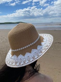 Unique design handcrafted summer hat with embroidered lace detailing. Hat dimensions: one size, adjustable, brim 7cm Bohemian Straw Bucket Hat With Short Brim, White Bohemian Crochet Hat For Vacation, Bohemian Beige Boater Hat With Curved Brim, Beige Bohemian Boater Hat With Curved Brim, Bohemian Brimmed Cream Sun Hat, Bohemian Cream Straw Hat For Summer, Cream Bohemian Straw Hat For Summer, White Bohemian Wide Brim Boater Hat, White Bohemian Wide Brim Bucket Hat