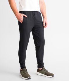 SAXX Trailzer Performance Jogger - Black Medium, Men's Black Solid knit jogger Inseam measures 29 Elasticized cinch tie waistband Front zipper pockets Back welt pocket Faux fly Moisture wicking Odor resistant Flat Out Seams have reverse stitching for an itch free experience. 89% Recycled Polyester 11% Elastane. Machine wash cold gentle cycle. Only non-chlorine bleach when needed. Tumble dry low. Iron low.. MEN'S ACTIVE SIZE CONVERSION CHART Size XS S M L XL XXL Waist 26-28 28-30 31-33 34-36 38-4 Casual Joggers With Functional Pockets For Jogging, Casual Jogging Pants With Functional Pockets, Casual Jogging Bottoms With Functional Pockets, Functional Joggers With Comfort Waistband And Tapered Leg, Functional Black Joggers With Ribbed Waistband, Urban Style Sports Joggers With Hip Pockets, Urban Joggers With Hip Pockets For Sports, Urban Joggers For Sports, Functional Midweight Joggers With Pockets