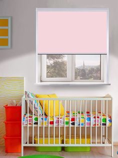 a child's room with a crib and window