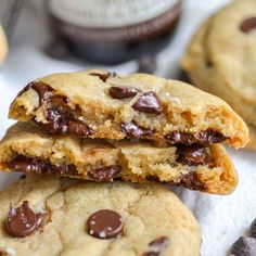 three chocolate chip cookies stacked on top of each other