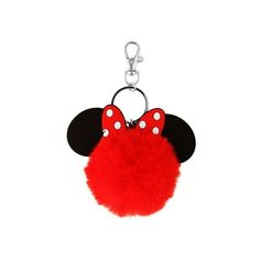 a red mickey mouse keychain with white polka dots on the front and black ears