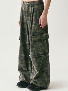 Featuring big size dimensional side pockets, these casual and stylish cargo pants have wide silhouette with front and knee tucks. They're made from high-density 7's cotton denim and are finished with high-quality sewing for durability.  - Zip and button fastening  - Two front slash pockets- Two side cargo pockets- One back flap pockets- Front tucks- Double knee tucks with rivets- Logo-engraved button and rivets- Logo leather label at back- Wide fit - Unisex wear Mountain Hardwear Pants, Khaki Wide-leg Cargo Jeans, Baggy Khaki Cotton Cargo Jeans, Baggy Cotton Cargo Jeans For Outdoor, Military Wide Leg Cotton Cargo Jeans, Military Style Baggy Wide Leg Cargo Pants, Baggy Military Style Cargo Pants With Wide Leg, Baggy Military Wide Leg Cargo Pants, Baggy Cargo Jeans With Patch Pockets For Outdoor