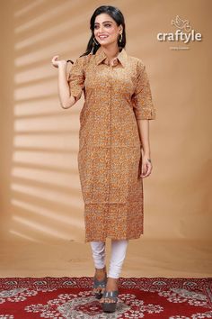 Elevate your style with our exquisite Ajrakh printed cotton kurti! Crafted with soft and breathable cotton fabric, this kurti features beautiful Ajrakh prints, reflecting rich cultural heritage. Perfect for both casual and semi-formal occasions, it offers comfort and elegance effortlessly. Sleeve Length : 3/4 Sleeves Design : Ajrakh Print Fabric : 100% Pure Cotton Wash : Dry Clean Get this exclusive Cotton Designer Kurti online at Craftyle - The best store for online shopping. Straight Cotton Silk Kurta With Bandhani Print, Bohemian Cotton Kurta With Kalamkari Print, Cotton Silk Bandhani Print Straight Kurta, Unstitched Cotton Traditional Wear With Batik Print, Cotton Straight Kurta With Traditional Patterns, Cotton Kurta With Block Print For Diwali, Cotton Kurta With Traditional Patterns For Navratri, Festive Cotton Traditional Wear With Batik Print, Cotton Diwali Kurta With Block Print