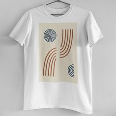 Geometric Mid Century Circle Lines Tee Brand New! Our In House T-Shirts Are High Quality And Printed On Demand. This Tee Features Gorgeous Shades Of Cream Beige, Terracotta Brown, And Indigo Blue, 100% Cotton, Relaxed Boyfriend Fit, And Print Of Circles And Broken Curved Lines. Size S-Xl Available (Model Is Wearing A Size M) Search Tags: Rust Crescent Natural Boho Bohemian Vintage Retro Aesthetic Mid Century Minimal Minimalist Modern Unisex Brown Cotton Top With Graphic Design, Brown Graphic Tee With Graphic Design, Mid Century Minimal, Ralph Lauren New York, Vintage Retro Aesthetic, Flower Crew, Coral Shirt, Lime Green Shorts, Nfl T Shirts