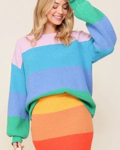 Elevate your style with our Bold Rainbow Stripe Oversized Chunky Knit Pullover. This eye-catching and playful pullover boasts a unique rainbow stripe design that's sure to turn heads. The drop shoulder and oversized fit provide a relaxed and comfortable feel, while the ribbed knit adds a cozy and warm texture, making it perfect for chilly days. With its classic round neckline, this pullover is easy to style with any bottom, whether it's jeans or skirts. Crafted from high-quality and soft knit ma Multicolor Skirt, Casual Night Out, Bold Stripes, Shoes With Jeans, Knit Pullover, Knitted Pullover Sweaters, China Fashion, Rainbow Stripes, Sheer Fabrics