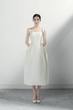 The dress with soft fabric and light color but extremely elegant will be the perfect choice for events and parties. Note:*Processing time takes 5-7 working days (NOT including shipping time).**The product can be customized according to measurements (bust,waist,hip) with an extra fee of 25% of the product value. Please contact support@meanblvd.com or send us a direct message on our fanpage for further assistance. Product Details - Product type: Midi Dress- Material: Bamboo Taffeta- Strappy- Strai Classic Midi Dress, Socialite Style, Classy Gowns, Holiday 2022, Puffy Skirt, Strappy Midi Dress, Mean Blvd, Kawaii Style, Black Outfits