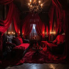 a living room with red drapes, couches and chandelier hanging from the ceiling