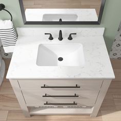 a bathroom vanity with a sink and mirror