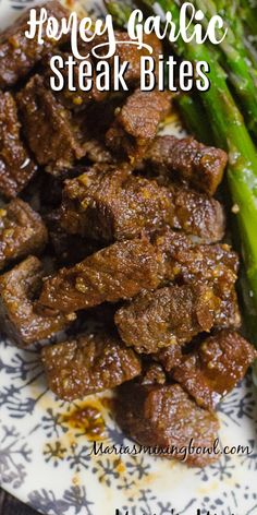 beef and asparagus on a plate with text overlay that reads honey garlic steak bites