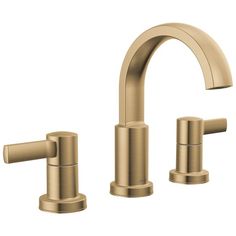 an image of two faucets with handles in brushed brass finish on a white background