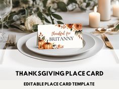 a thanksgiving place card is displayed on a plate with candles and flowers in the background