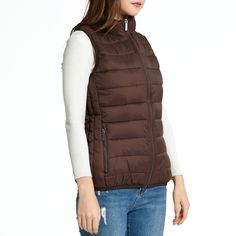 Jodie Womens Puffer Vest By Alpine Swiss Product Features: 100% Nylon Shell, 100% Polyester Fill & Lining STYLISH – The Jodie womens puffer vest is stylish and versatile. Wear it over T-shirts, long sleeve shirts, button downs, or sweaters for endless combinations of warm and fashionable ensembles. WARM – A down alternative filling makes this vest ultra-lightweight and comfortably warm while allowing your arms to have full range of motion. WATER RESISTANT – The nylon shell construction is durabl Trendy Nylon Vest For Fall, Casual Nylon Vest For Fall, Bubble Vest, Womens Puffer Vest, Brand Store, Range Of Motion, Puffer Vest, Daily Routine, Front Zipper