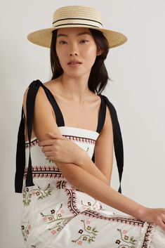 Eugenia Kim hits reset on the classic boater hat, refreshing it with signature contemporary elegance. This 'Colette' style is woven from natural hemp-blend and wrapped with a striped grosgrain ribbon. Wear it to garden parties, regattas and or a summer wedding. Luxury Woven Natural Boater Hat, Luxury Woven Brimmed Boater Hat, Chic Handwoven Brimmed Straw Hat, Beige Woven Brimmed Boater Hat, Striped Brimmed Straw Hat, Designer Bucket Hats, Denim Flats, Designer Hats, Floral Dresses Short