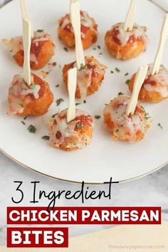 chicken parmesan bites on a white plate with text overlay that reads 3 ingredient chicken parmesan bites