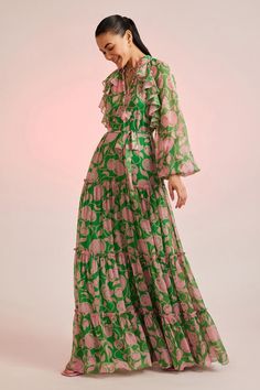 Green, pink tiered maxi dress with fruit motifs, raglan puff sleeves and embellished bodice. Paired with belt.
Component: 2
Pattern: Embellished
Neckline: Mandarin
Sleeve Type: Raglan Sleeves
Fabric: Chiffon
Color: Green,Pink
Other Details: 
Ruffle detail
Front tie-up
Occasion: Party - Aza Fashions Pankaj And Nidhi, Tie Up Dress, Maxi Dress For Women, Maxi Dress Pattern, Muslim Fashion Dress, Maxi Dress Online, Long Dress Casual, Floral Fashion, Modest Fashion Outfits