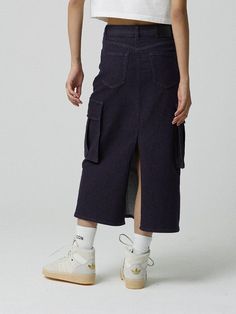 This is a comfortable and trendy skirt by MAGOODGAN that is made out of high quality cotton blend fabric. With unique design detail with trendy look, it will stand out from your casual and young daily outfit.- Rinse washed non fade denim fabric- Big pockets detail on the side- Elastic waistband- Deep vent on the back High Waist Cargo Skirt For Spring Streetwear, Trendy Streetwear Skirt With Pockets, Casual Relaxed Fit Pencil Skirt, High Waist Cotton Denim Skirt For Fall, Casual High Waist Skirt For Streetwear, Trendy Relaxed Knee-length Denim Skirt, Chic Denim Skirt With Pockets, Trendy Cotton Skirt For A Day Out, Trendy Knee-length Relaxed Denim Skirt