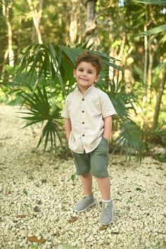 Upgrade your little one's wardrobe with our stylish and eco-friendly short sleeve button-up shirt for kids. Crafted using premium bamboo fibers blended with cotton, this shirt offers a luxurious feel that's irresistibly soft and exceptionally comfortable against the skin. The unique combination of materials grants the cotton a lavish, silky texture, elevating your child's comfort to new heights. Unveil a fabric of unparalleled richness that effortlessly suits various occasions, from laid-back outings to semi-formal gatherings. Whether it's a sunlit afternoon adventure or a twilight affair, this versatile shirt effortlessly transitions between day and evening wear, ensuring your child looks and feels their best no matter the time of day. Choose from an array of six delightful colors, though Casual Beige Camp Collar Shirt, Boys Safari Outfit, Linen Boys Outfit, Khaki Relaxed Fit Short Sleeve Button-up Shirt, Boys Linen Shirt, Bamboo Clothing, Kids Pants, Short Sleeve Button Up, Neutral Outfit