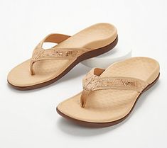 Ride the wave and slip into summer when you wear these Tide II sandals. Their comfy, chic design is sure to make a splash! From Vionic®. Summer Flip Flops With Textured Footbed And Toe Loop, Summer Toe Loop Flip Flops With Textured Footbed, Beige Flip Flops With Single Toe Strap For Beach, Beige Single Toe Strap Flip Flops For The Beach, Beige Flip Flops For Beach, Summer Toe Loop Flip Flops With Cushioned Footbed, Beach T-strap Sandals With Toe Loop And Arch Support, Summer T-strap Toe Post Sandals With Arch Support, Toe Post Flip Flops For Summer Outings