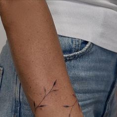 a person with a tattoo on their arm