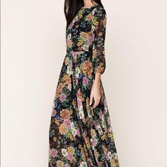 A Romantic Floral Print Complements The Elegant, Bohemian Feel Of Our Woodstock Floral Print Maxi Dress. Details Include A Full-Length Skirt, 3/4 Blouson Sleeves, And Hidden Back Zip. Lined Wore One Time To A Wedding. Professionally Altered The Length To Fit A 5’2 With 4” Heals. 59” From Shoulder To Hem. Fall Party Maxi Dress With 3/4 Sleeves, Bohemian Midi Length Maxi Dress For Cocktail, Floral Print 3/4 Sleeve Maxi Dress For Brunch, 3/4 Sleeve Floral Print Maxi Dress For Brunch, Floral Print Maxi Dress With 3/4 Sleeves For Brunch, Brunch Floral Print Maxi Dress With 3/4 Sleeve, Elegant Spring Maxi Dress With 3/4 Sleeves, Elegant Flowy Maxi Dress With 3/4 Sleeves, Chic Flowy Maxi Dress With 3/4 Sleeves