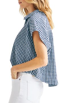 A boxy, unstructured fit adds ease to the casual charm of a cheery gingham seersucker shirt. 22" length Front button closure Spread collar Short sleeves 70% cotton, 28% rayon, 2% spandex Machine wash, line dry Imported Gingham Tops With Button Closure And Relaxed Fit, Relaxed Fit Gingham Tops With Button Closure, Relaxed Fit Gingham Collared Shirt, Cheap Gingham Button-up Blouse, Relaxed Fit Gingham Button-up Shirt, Seersucker Shirt, Gingham Tops, Gingham Shirt, Striped Shirt