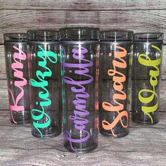 four personalized tumblers with the words grandma on them