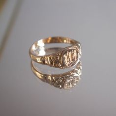 This ring is an Edwardian inspired signet ring that is designed and hand engraved just for you. This ring was originally hand carved in wax, and engraving is done completely by hand, which aims to stay true to the vintage vibe of the design. 8 karat gold is a lower grade of gold used often in vintage items. As it tends to darken slightly over time, this adds to the overall effect. Material: 8 Karat Gold (please message for 14, 18 or 22K gold, which are also available.)Custom engraving is availab Ceremonial 14k Gold Signet Ring With Polished Finish, 14k Gold Ceremonial Signet Ring With Polished Finish, Ceremonial Gold Engraved Ring, Victorian Engraved Yellow Gold Ring With Intaglio, Victorian 14k Gold Signet Ring With Initials, Victorian Yellow Gold Engraved Ring With Intaglio, Ceremonial Gold Engraved Ring With Engraving Option, Ceremonial 14k Gold Engraved Ring With Polished Finish, Victorian Gold Signet Ring With Initials