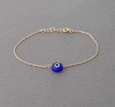 evil eye bracelet Minimalist Blue Bracelet With Delicate Chain, Blue Dainty 14k Gold-filled Jewelry, Dainty Blue 14k Gold-filled Jewelry, Simple Blue Everyday Jewelry, Elegant 14k Gold-filled Evil Eye Jewelry, Delicate 14k Gold-filled Blue Jewelry, Delicate 14k Gold Filled Blue Jewelry, Delicate Blue 14k Gold Filled Jewelry, Blue Minimalist 14k Gold Filled Bracelets