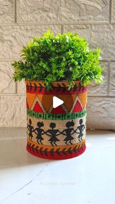 a potted plant sitting on top of a table