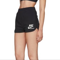 The Nike Sportswear Archive Women's Shorts Resurrect '90s Style With A High-Waisted Design, Stretchy Jersey Fabric And Retro Nike Branding. They're Made With A Slim Fit That Follows Your Body's Shape Closely While Letting You Move Freelyslim-Fit Stretch Cotton-Blend Jersey Shorts In Black. High-Rise. Two-Pocket Styling. Logo Bonded In White At Front. Rounded Hem. Tonal Stitching Summer Sportswear Bottoms With Letter Print, Nike Sporty Leisure Bottoms, Sporty Bottoms With Letter Print, Athleisure Bottoms With Letter Print For Spring, Spring Athleisure Bottoms With Letter Print, Nike Bottoms With Built-in Shorts For Leisure, Short Athleisure Bottoms With Letter Print, Nike Sportswear Bottoms For Summer, Casual Streetwear Athletic Shorts