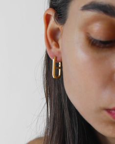 DETAILS : ▪ 18K Gold Vermeil Earrings▪ Base Metal - Solid 925 Sterling Silver▪ Hypoallergenic▪ Lightweight▪ Hoops Size - 24x13mm▪ Water Resistant▪ Shipps from Berlin▪ Orders to the US - No Customs Fees Upon the Delivery MATERIALS : ～18k gold vermeil. Do not confuse it with a regular 0.5 microns gold plating over a brass base. Gold vermeil jewelry has a solid 925 sterling silver base coated with a very thick, 2.5-micron layer of 18k gold. Simple earrings belong in every good jewelry collection! That's why we designed a stunning pair for you. These earrings are classic and are naturally lightweight. The earrings are handcrafted in vermeil, a thick 18K gold layer on solid 925 sterling silver, so you can comfortably wear them all day long with any of your outfits. Gold Oval Huggie Earrings Fine Jewelry, Oval Gold Huggie Earrings As Gift, Gold Hallmarked Huggie Earrings For Gifts, Oval Hallmarked Huggie Earrings Gift, Hallmarked Gold Huggie Earrings For Gift, Simple Gold Hoop Earrings, Gold Vermeil Jewelry, Rectangle Earrings, Vermeil Jewelry