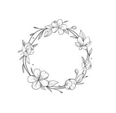 a circle with flowers and leaves around it