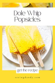 two popsicles are sitting on a plate with lemon wedges in the background and text that reads dole whip popsicles get the recipe