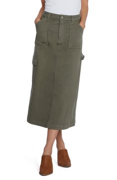 The traditionally rugged cargo aesthetic gets a refined makeover in this olive-hued midi detailed with plenty of pockets and a high back slit for easy movement. 31 1/2" length 54% cotton, 22% polyester, 14% lyocell, 9% rayon, 1% spandex Machine wash, tumble dry Imported Cargo Aesthetic, Cargo Midi Skirt, Cargo Outfit, Denim Waistcoat, Denim Skirt Outfits, Denim Maxi, Denim Patches, Denim Maxi Skirt, Cargo Skirt