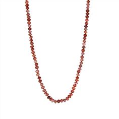 Elevate your accessory game with the Carnelian 22.5" necklace, expertly hand-knotted with silk thread and finished with a gold-filled clasp. Known for its vibrant hues, Carnelian is believed to promote courage, vitality, and creativity. This versatile necklace allows for easy customization, as charms can be effortlessly added or removed from the clasp. Single Strand Carnelian Necklace For Healing, Carnelian Single Strand Necklace For Healing, Orange Oval Carnelian Necklaces, Red Faceted Carnelian Necklaces, Vintage Carnelian Beaded Necklace, Vintage Carnelian Oval Bead Necklace, Red Carnelian Polished Necklace, Antique Carnelian Pendant Necklace, Pearl Charm Necklace