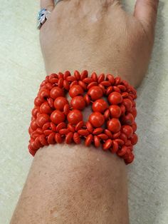 Metal Free, Candy Apple Red, Wooden Beaded Bracelet, Expandable Bracelet, Costume Jewelry, Fashion Accessory This is a great little find and priced to sell.  This is 2 inches in diameter and does expand to 4 inches.  Total length is 8 inches long if laid flat and cut in half.  This is 2.40 inches wide. Check out our shop for monthly specials. We have a variety of items for every taste. Combine several of our items together to save on shipping. If you have any questions, please do not hesitate to Adjustable Red Beaded Bracelets With Wooden Beads, Red Beaded Bangle Bracelets, Red Wooden Beads Bracelets As Gift, Red Beaded Bangle Bracelet, Handmade Red Beaded Bangle Bracelets, Unique Hand-strung Red Bracelets, Handmade Red Beaded Bangle Bracelet, Unique Red Beaded Bangle Bracelet, Red Wooden Bead Bracelets