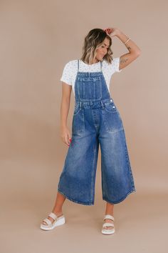 Make a bold style statement with the OLI & HALI: Denim Overall. This trendy piece combines comfort and fashion in an effortlessly chic design. Dress it down with sneakers for a laid-back look! Denim Overalls Adjustable straps Elastic on the sides of the waist Functional Pockets Spaghetti straps MEASUREMENTS:S: INSEAM: 24” | RISE: 12.25”M: INSEAM: 24.5” | RISE: 12.5”L: INSEAM: 25” | RISE: 12.75”XL: INSEAM: 25.5” | RISE: 13” Model Specs: Emily is wearing a size small in the photo.How will this ite